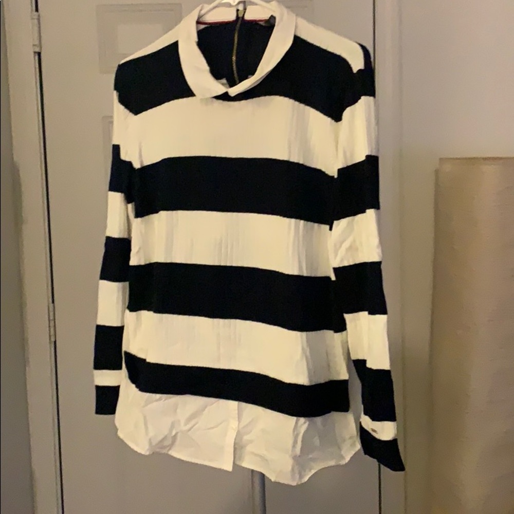 Sweater layered over woven